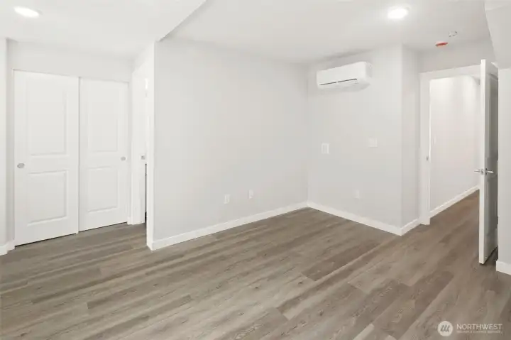 oversized bedroom on the lower level, with en-suite bath