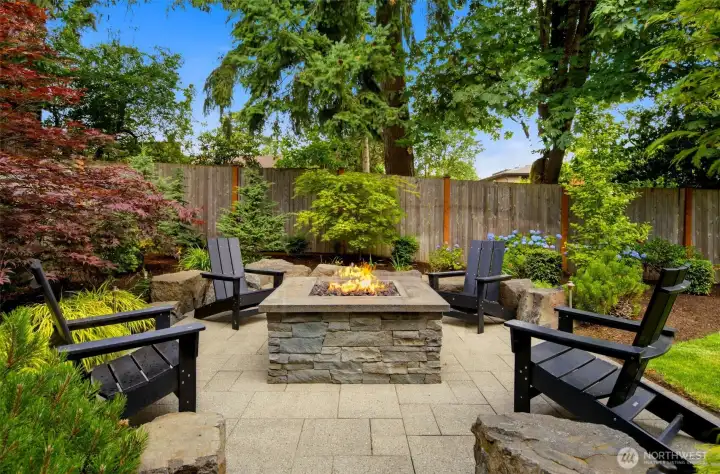Outdoor fire pit is gas plumbed for easy summertime enjoyment and use