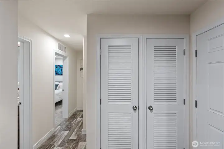Hall to Bathroom, Guest Bed and Primary Suite Hall to Bathroom, Guest Bed and Primary Suite