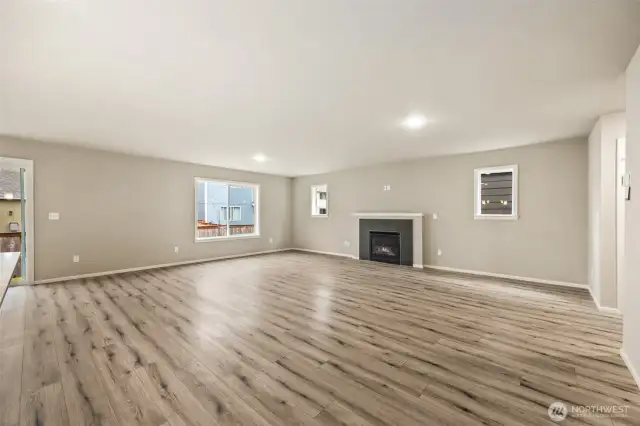 Open concept living/dining/kitchen-Interior Pictures: Disclaimer- Photos are of another Finley floor plan from a previous community, photos are for illustrative purposes only. Finishes, flooring, upgrades, or other features may vary.