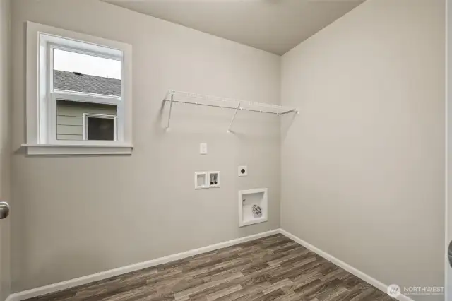 Laundry Room on2nd floor-Interior Pictures: Disclaimer- Photos are of another Finley floor plan from a previous community, photos are for illustrative purposes only. Finishes, flooring, upgrades, or other features may vary.