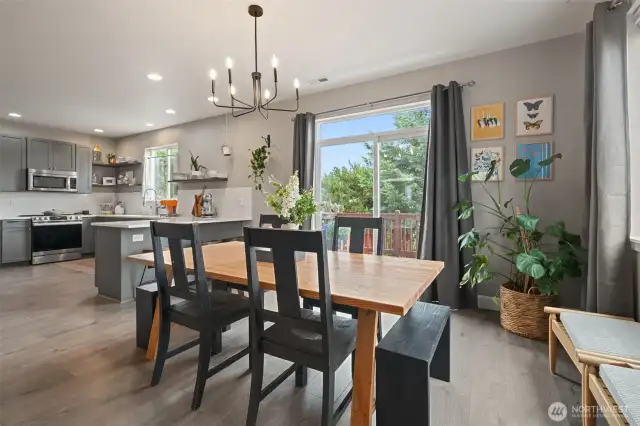 From the dining room, you have deck access - perfect for summer BBQs.
