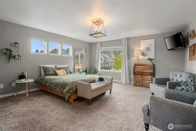 The upstairs primary bedroom is your perfect retreat!