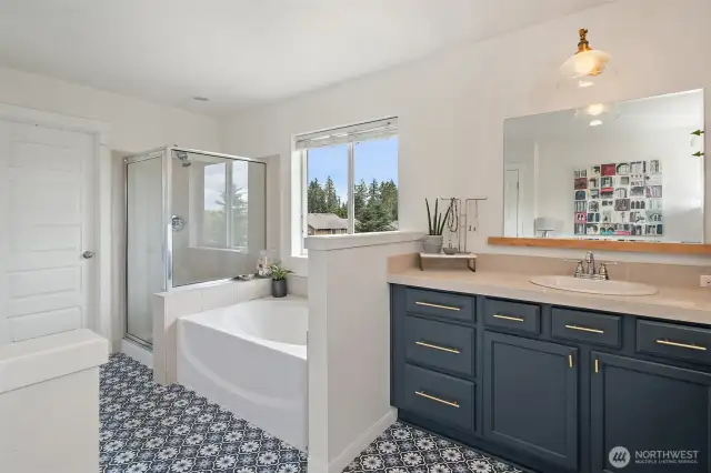 A walk-in shower and a spacious, walk-in closet make this an ideal en-suite.