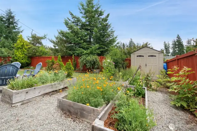 Raised beds for your gardening, and a handy storage shed for all the garden tools.