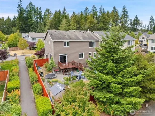 A path for neighborhood access to the park is shown here to the left of the fence. This extra space between the two homes gives you additional privacy.
