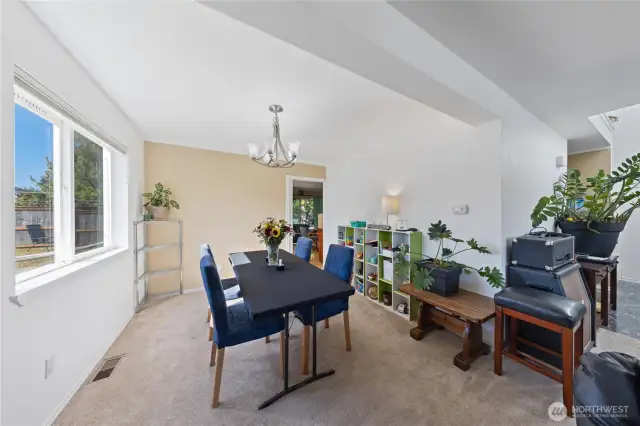 This photo shows the formal dining room on the left with the foyer on the right.  The living room is behind this photo.