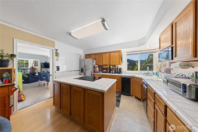 The kitchen is very large and is conveniently located next to the formal dining room.  Items have been removed to allow for a better feel for the space available. Lots of counter space and storage.