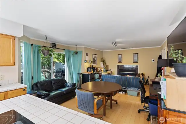 You can see the BBQ and tables out on the deck.  Those sliders are perfect for taking the hamburger buns and drinks outside.  This outside living space is very useable!
