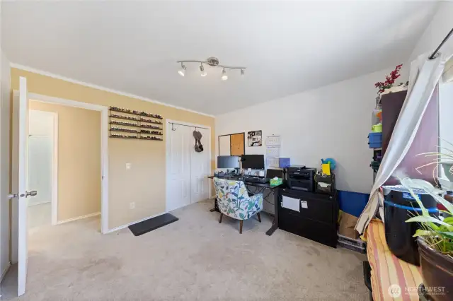 This shows the upper bedroom/office and the bathroom across the way.