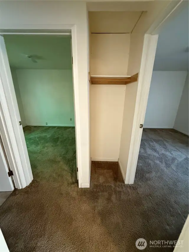 Bath on the left and two bedrooms left and right
