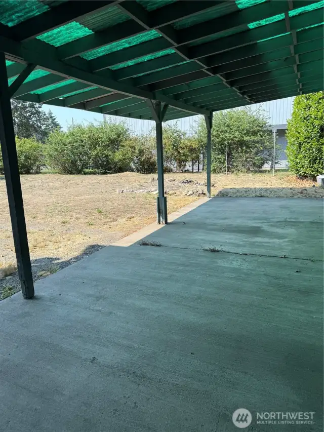 Large yard and big covered patio