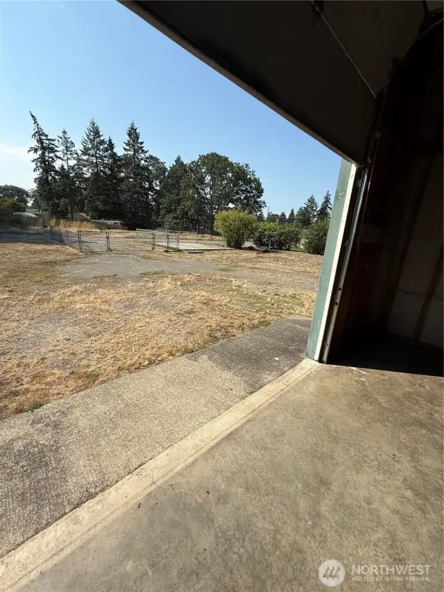 There is an alley in the back of this property and the property next door that is also available for sale