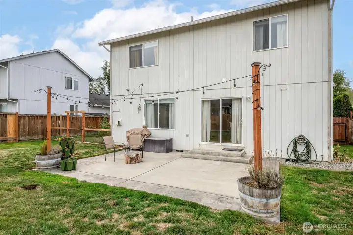 Patio doors connect to the kitchen.