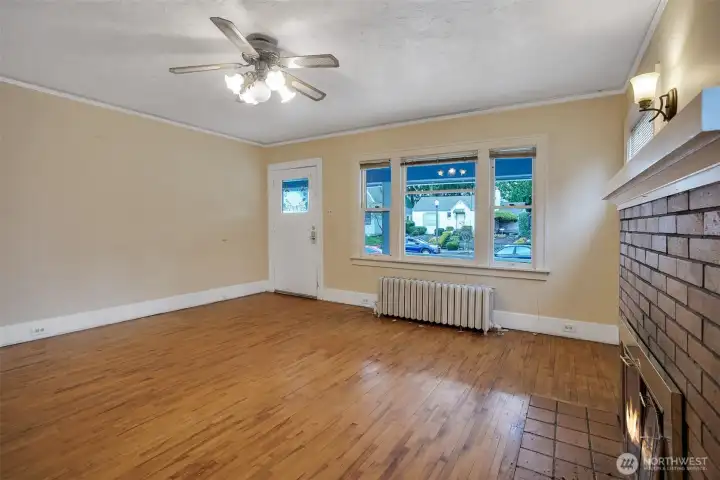 As you enter the home you are greeted by hardwood floors and classic design touches.