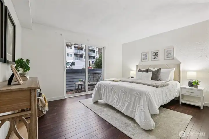Bedroom with sliding door access to the private patio