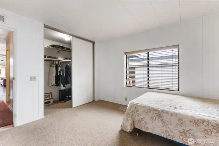 The primary bedroom has a walk in closet