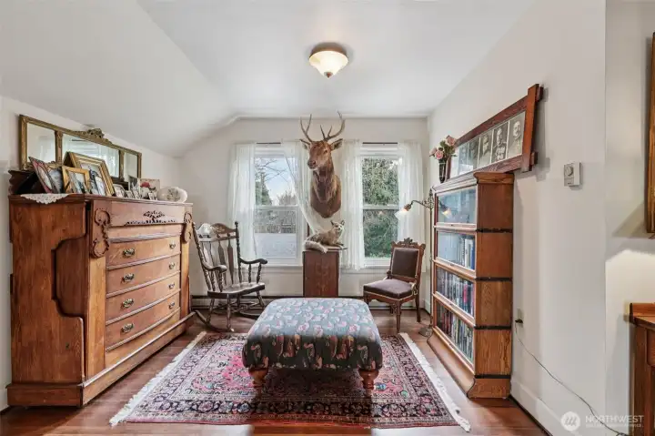 Enjoy a quiet book or cup of coffee in your new sitting room at the top of the stairs.