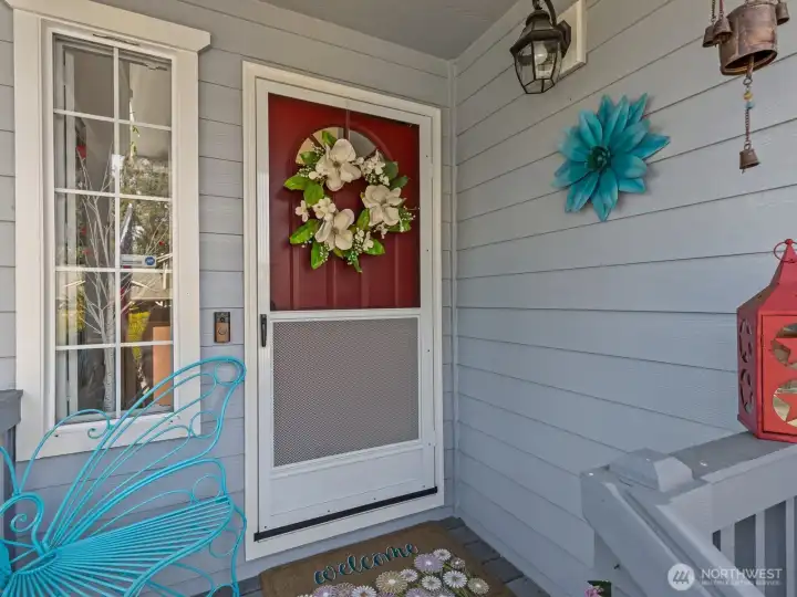 Cute front porch greets you as you walk up to the front door.