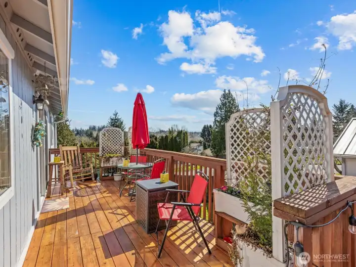 Look out at the mountain views from the amazing deck. You might even be able to see Mount Rainier.