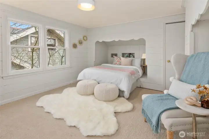 One of two upstairs light filled bedrooms.
