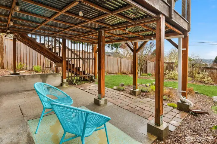 Covered patio area off the lower level.