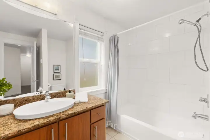 Bathroom with full tub