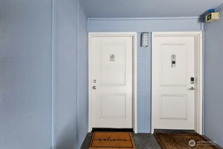 Front door to the condo is on the left