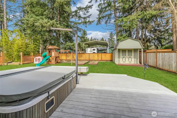 Hot tub, trex deck, storage shed with power