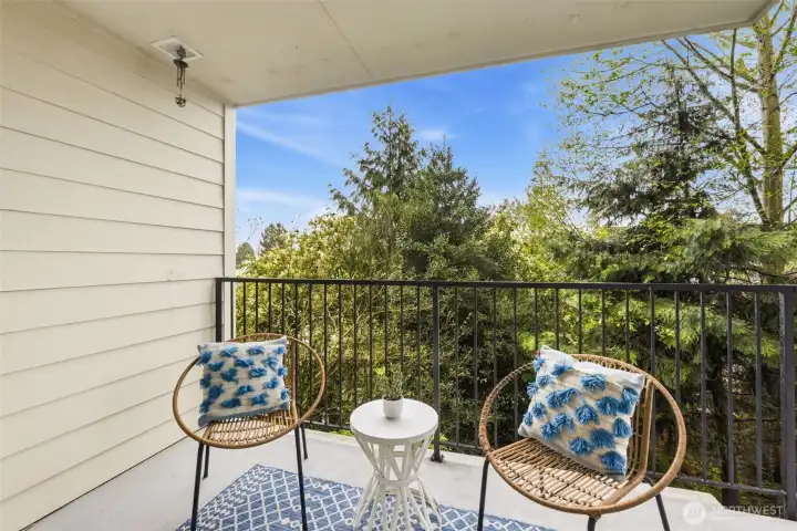 Ample space for patio furniture and an outdoor storage container.
