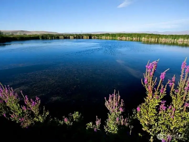 One of Three Lakes.   60 acres of water!!  Irrigation is possible out of Hilltop lake via a M & I contract with the Bureau of Reclamation.  Municipal water rights are available for purchase and transfer.