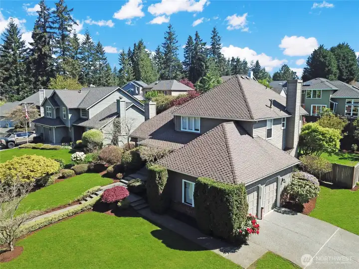 Discover a beautifully landscaped home nestled in a quiet neighborhood. Green space across the road with walking trails to enjoy.