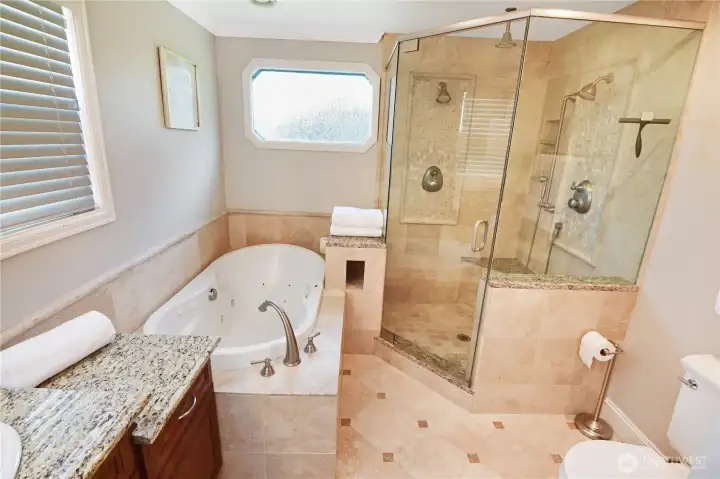 A closer view of the large shower and jetted tub for your relaxation.