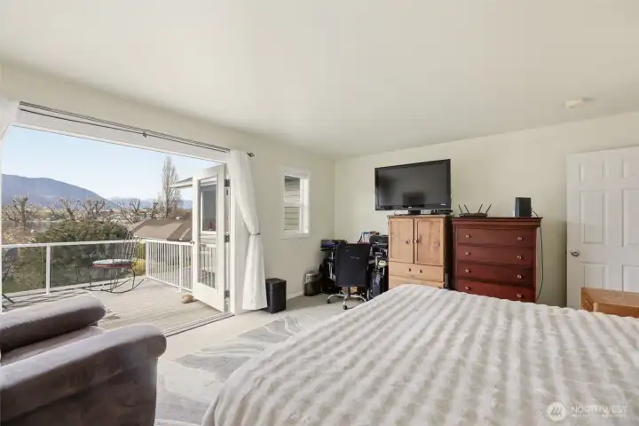 French doors that lead to your owner suite balcony