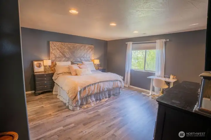 Primary bedroom with lots of natural lighting!