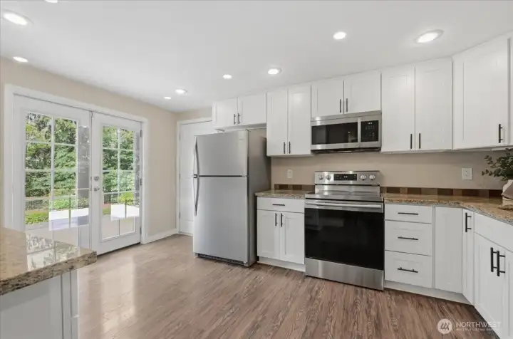 French doors bring in natural light into kitchen