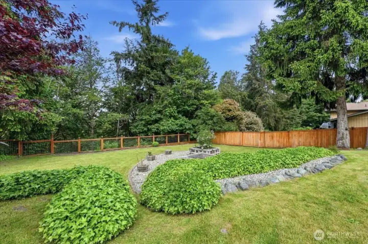 Fully fenced backyard backs to greenbelt