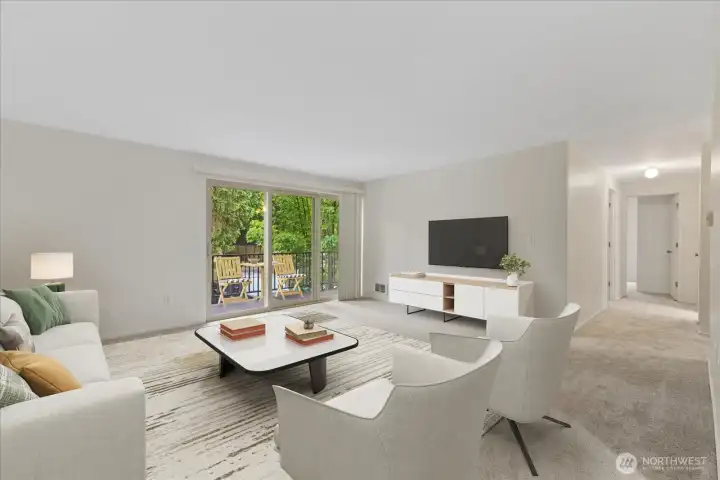 Virtually staged living room with view to hall and bedrooms beyond.
