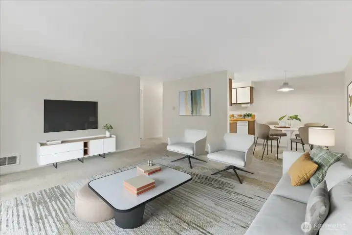 Virtually staged view of the large living room with dining room and kitchen in the background.
