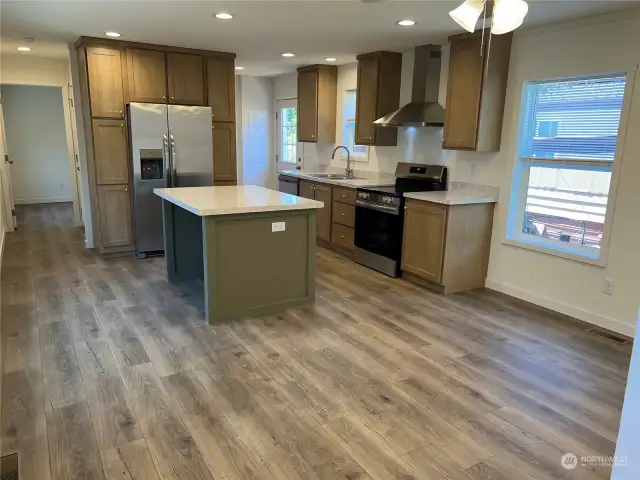 Another view of kitchen from living area.