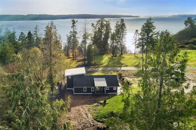 Panoramic vistas of the stunning Puget Sound, Hood Canal, and peek-a-boo Olympic Mountains.