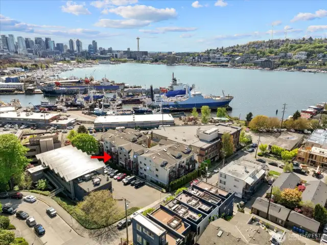 Unit #206 is tucked away on the quite side of this Lake facing building