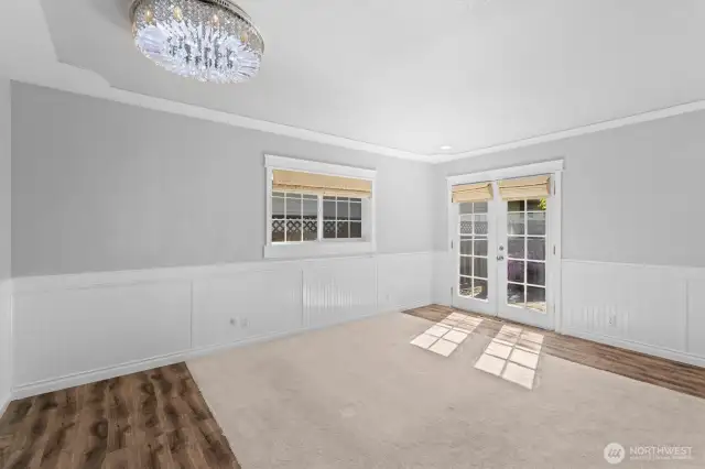 Primary Bedroom with private deck through the french doors