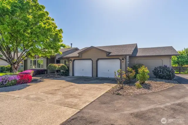 This 2 car garage has a smaller third bay for a work shop/storage