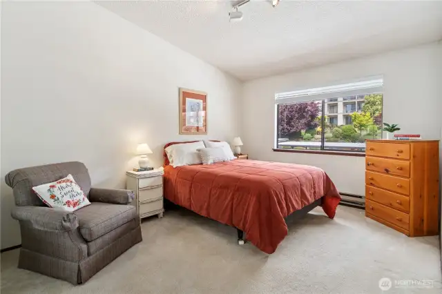 Primary bedroom has ample space for additional furniture.