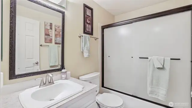 Convenient upstairs full bathroom, perfectly designed for guests and everyday use