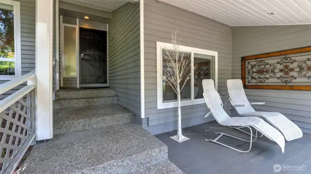 Elegant walk-up entrance leads to an expansive covered patio—ideal for stylish outdoor living and year-round enjoyment, with room for outdoor seating, a cozy couch, or a full table setup