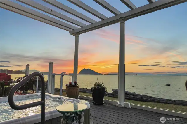 Soak in the hot tub while relaxing with the view