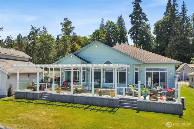 The deck runs the entire length of the home