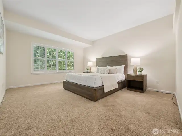 Beautiful year round views of natural greenery from both great room and primary bedroom.